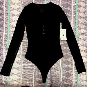 NWT! Nike W YOGA LUXE Henley Black Bodysuit